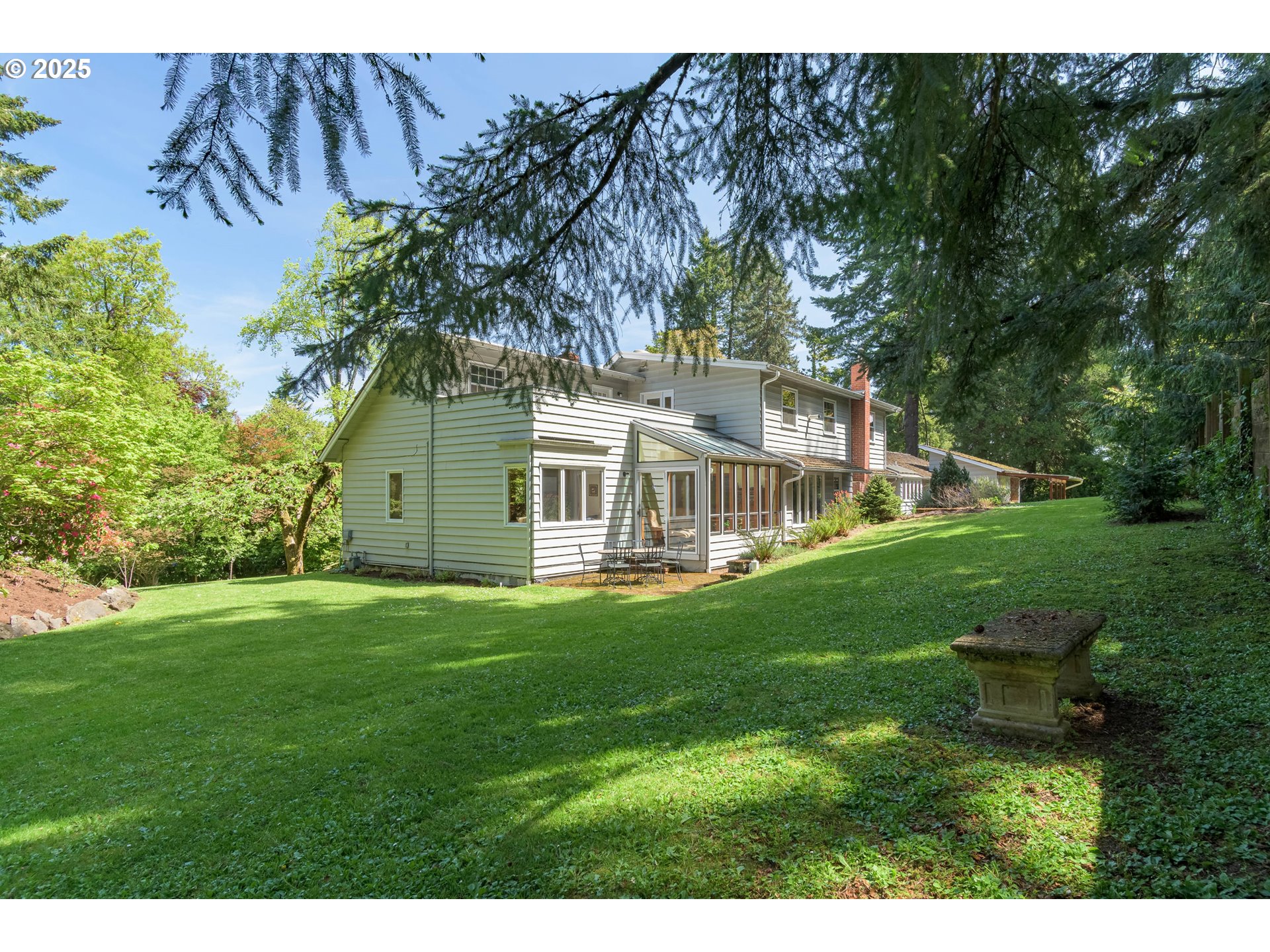 888 Crest Drive Eugene, OR 97405 - Photo 42 of 48 a view of a house with a yard
