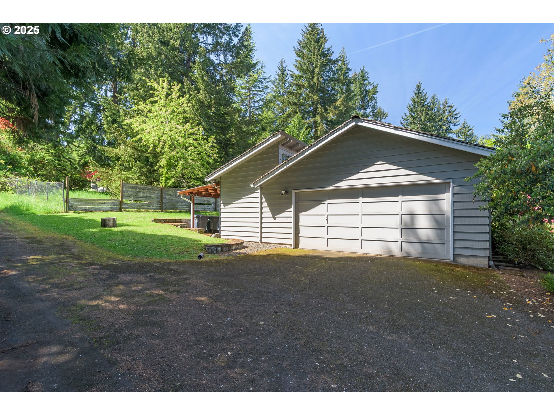 888 Crest Drive Eugene, OR 97405 - Photo 44 of 48 a view of a house with a yard