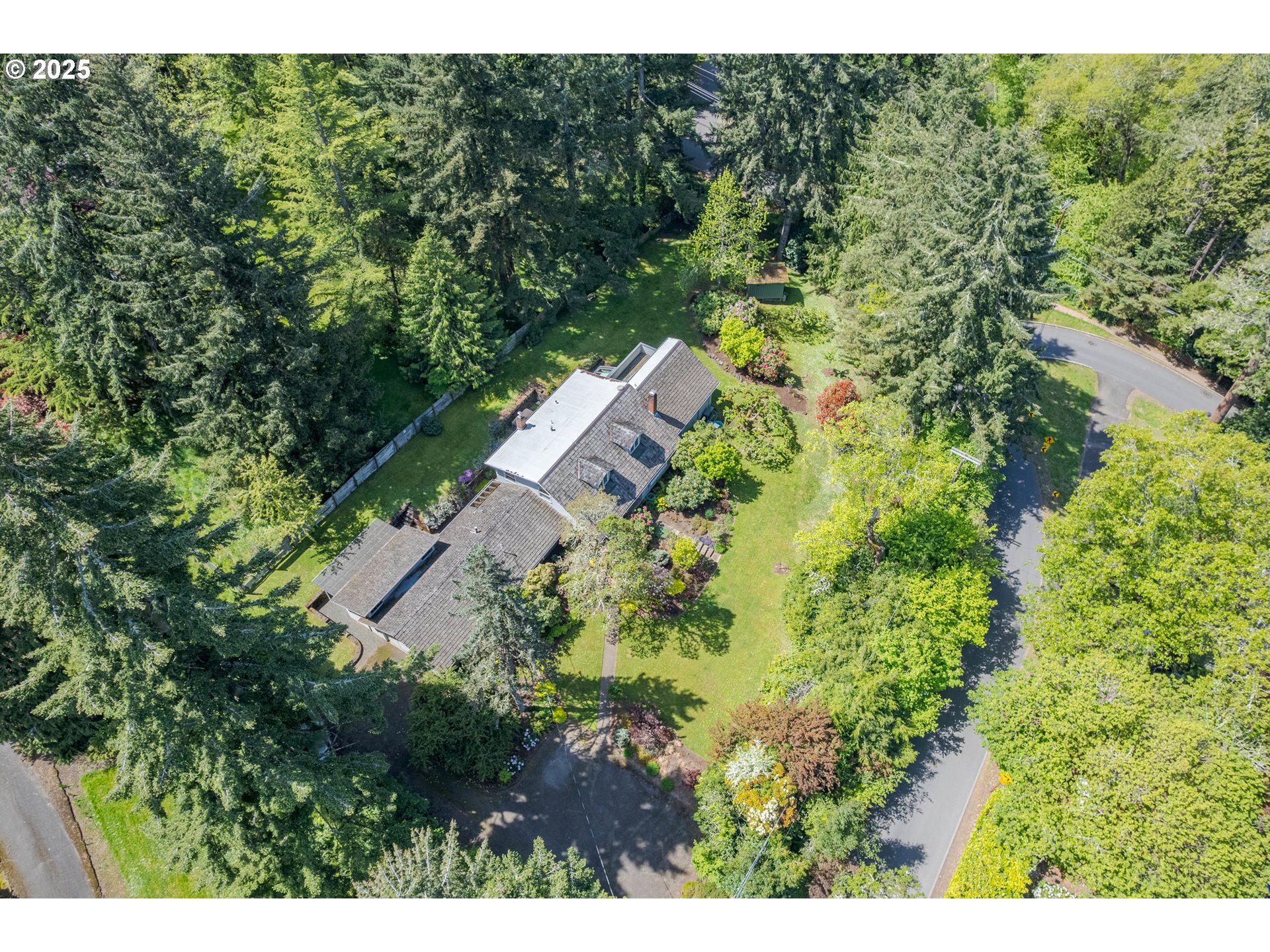 888 Crest Drive Eugene, OR 97405 - Photo 47 of 48 a view of a garden with plants