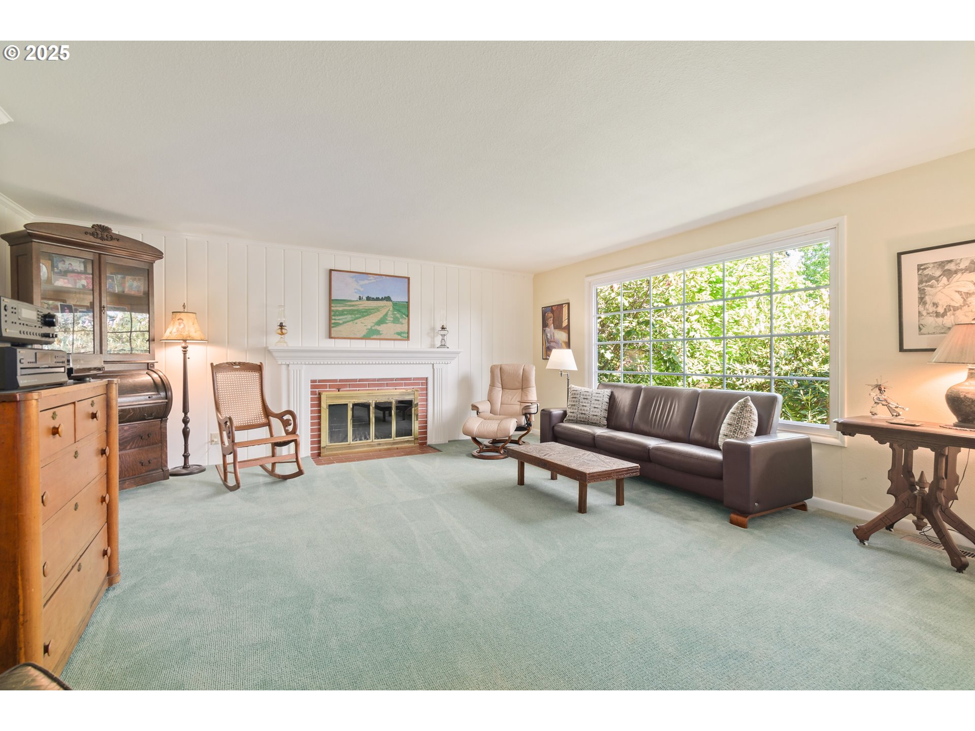 888 Crest Drive Eugene, OR 97405 - Photo 5 of 48 a living room with furniture and a fireplace