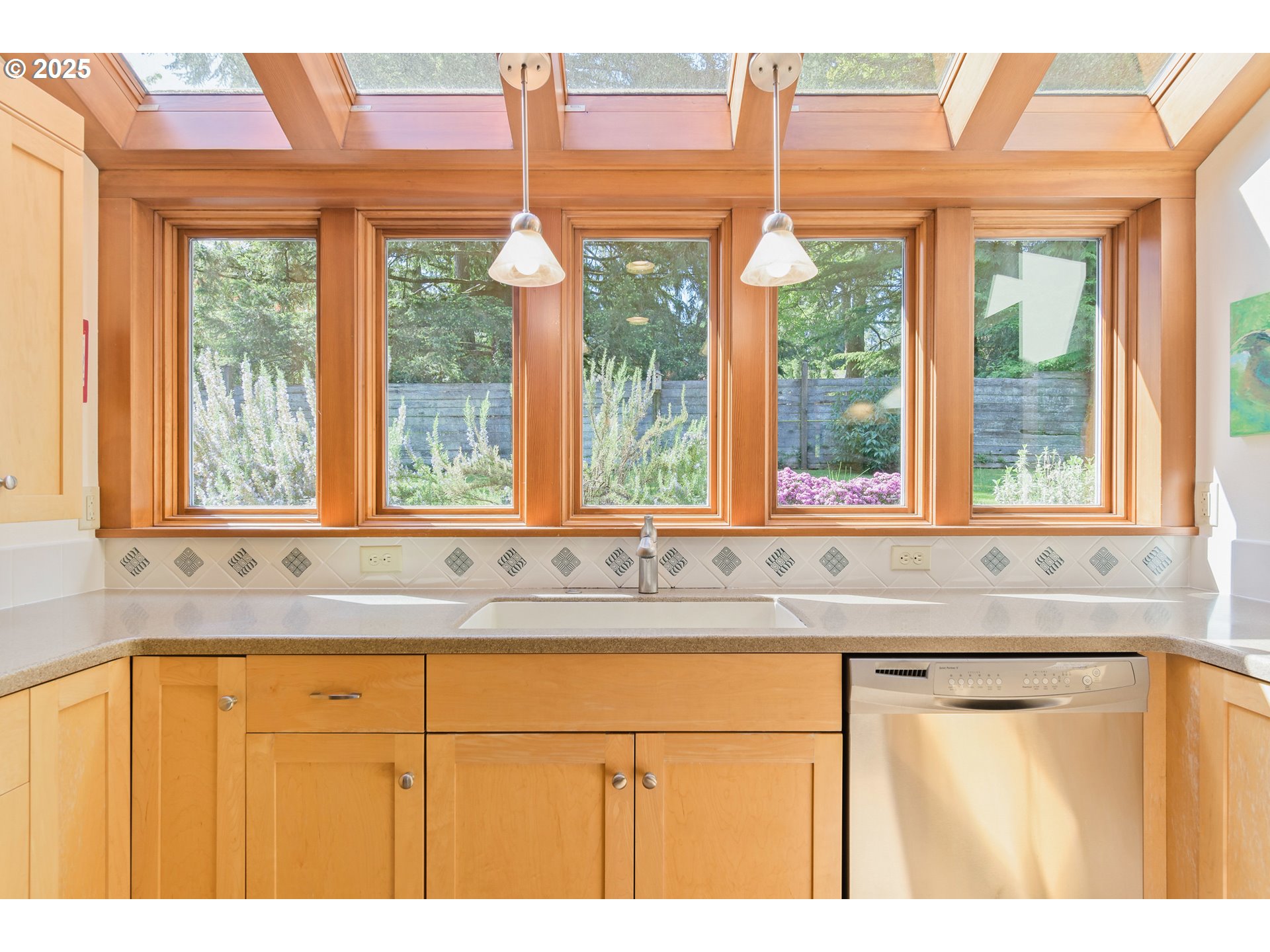 888 Crest Drive Eugene, OR 97405 - Photo 9 of 48 a bathroom with a window and a shower
