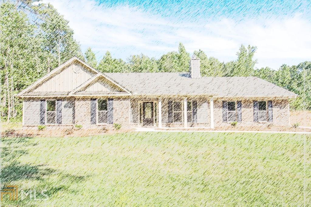 1660 Ike Stone Road, Unit 1 Monroe, GA 30656 - Photo 1 of 1 a front view of a house with a garden