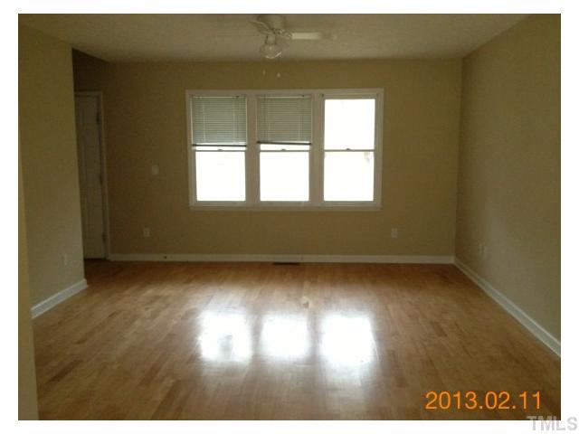 6617 Hammersmith Drive Raleigh, NC 27613 - Photo 6 of 13 a view of an empty room and window