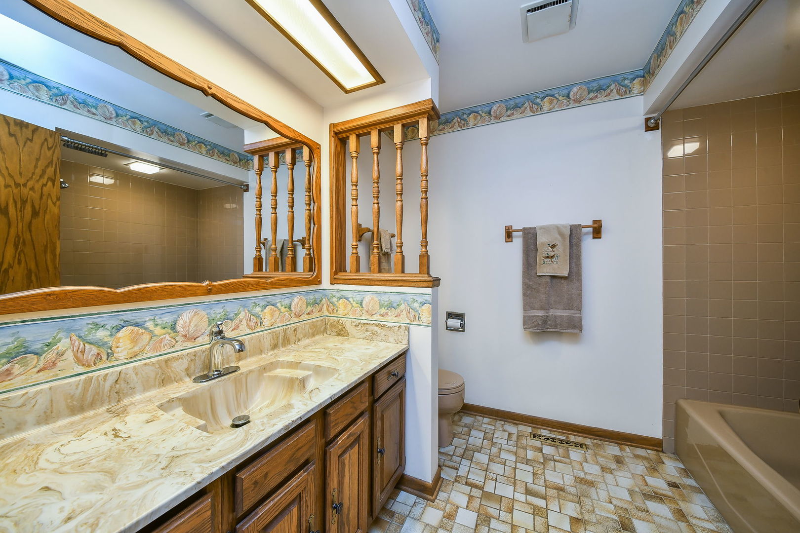 6N347 Old Homestead Road St. Charles, IL 60175 - Photo 18 of 25 a bathroom with a sink and a mirror