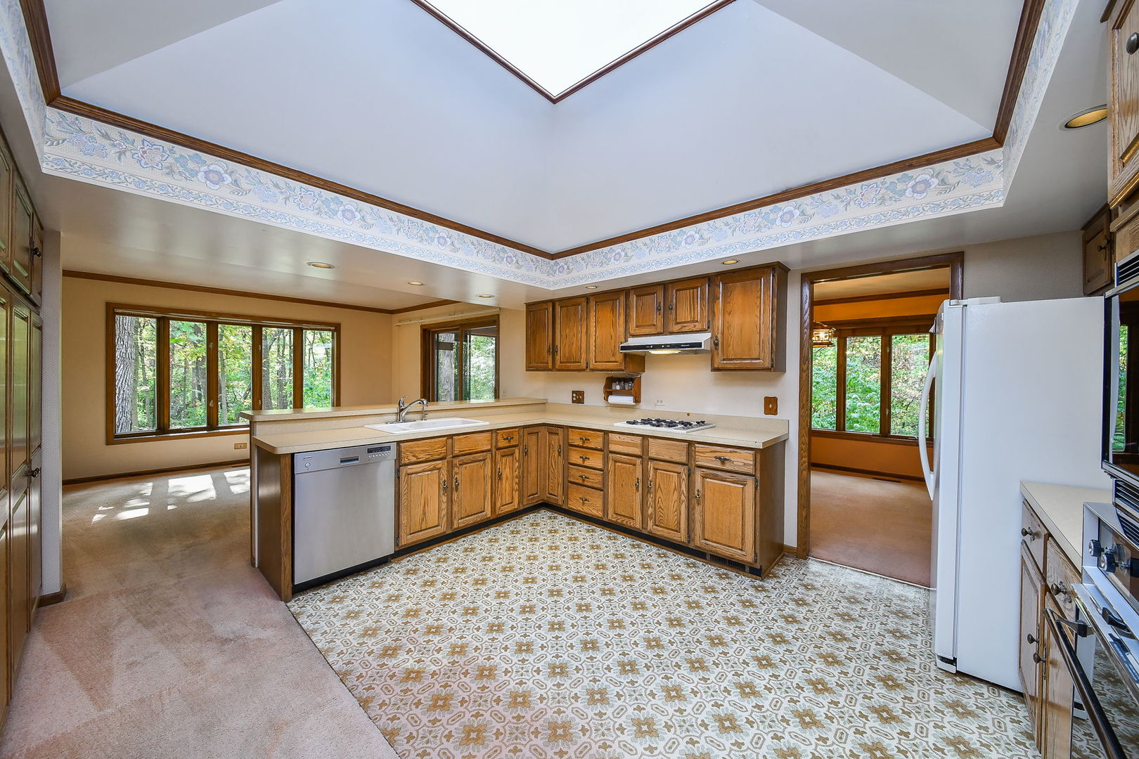 6N347 Old Homestead Road St. Charles, IL 60175 - Photo 9 of 25 a kitchen with a sink stove and refrigerator