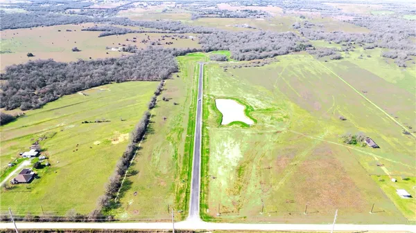 a view of swimming pool from a balcony