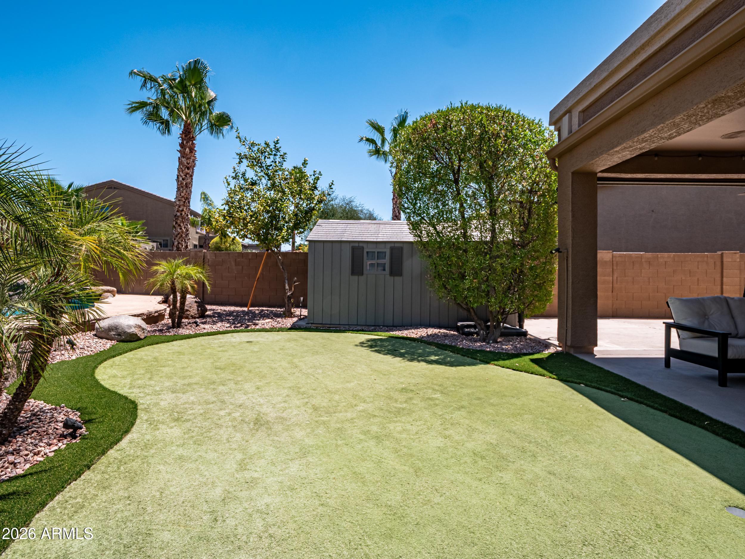 3416 West Montello Road Phoenix, AZ 85086 - Photo 63 of 68 Putting green and shed