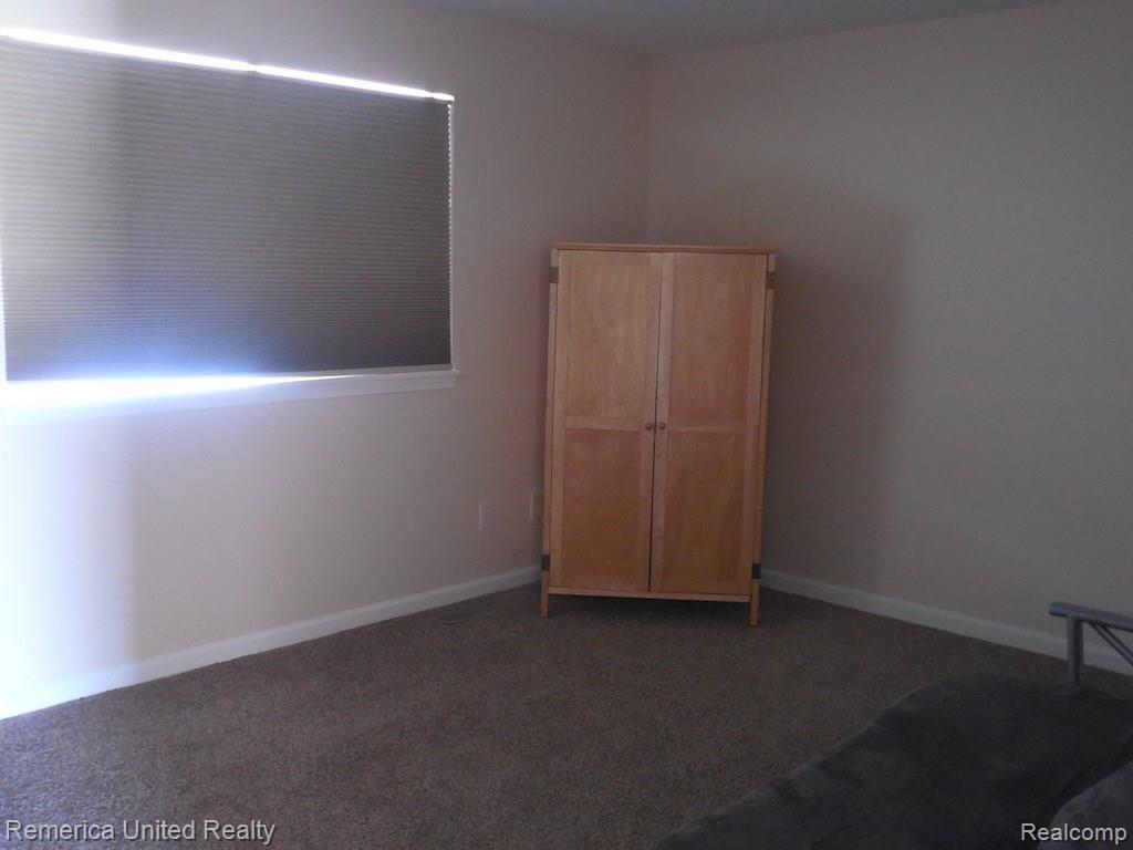 1281 East Jones Road Howell, MI 48855 - Photo 15 of 21 Upstairs Bedroom 2