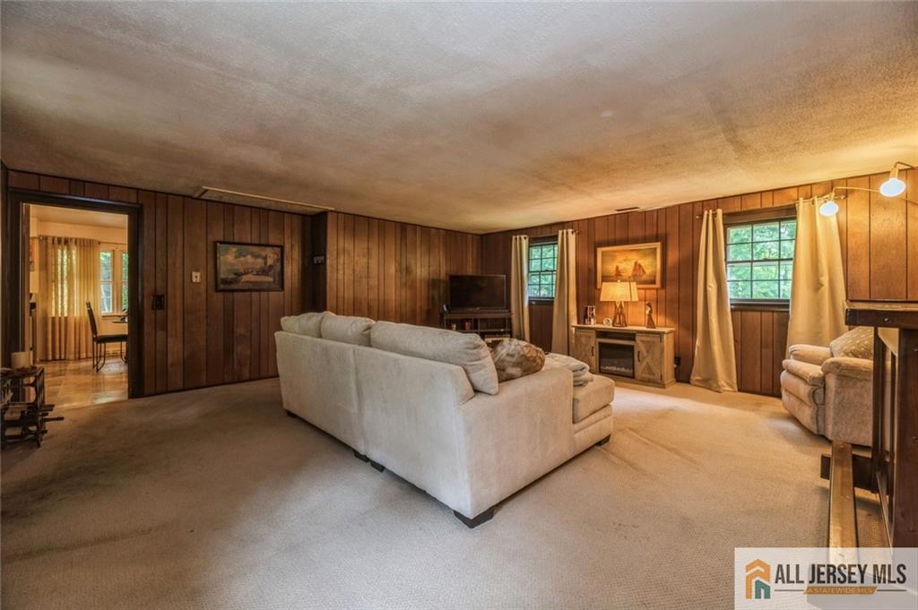 129 Cottrell Road Old Bridge, NJ 07747 - Photo 18 of 25 a living room with furniture and a window