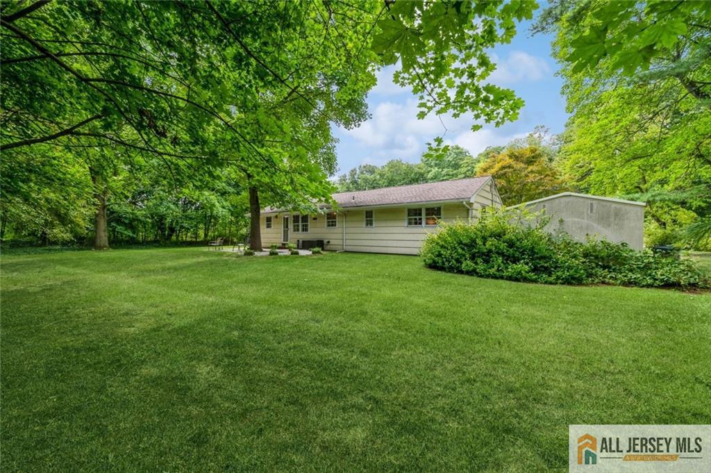 129 Cottrell Road Old Bridge, NJ 07747 - Photo 22 of 25 a view of a house with a yard