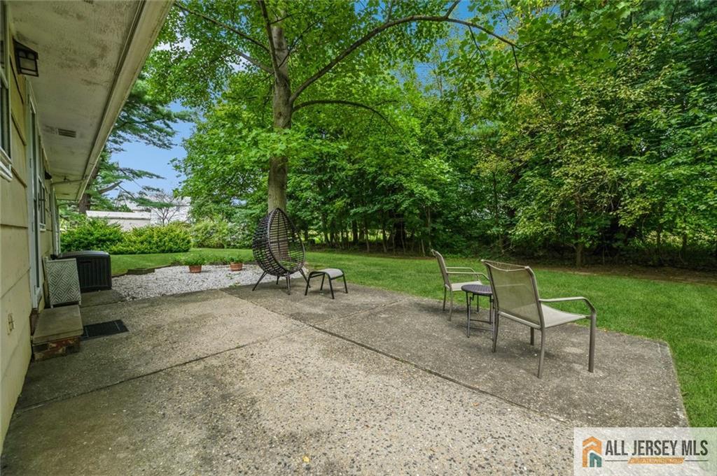 129 Cottrell Road Old Bridge, NJ 07747 - Photo 23 of 25 a view of a park with bench sitting area