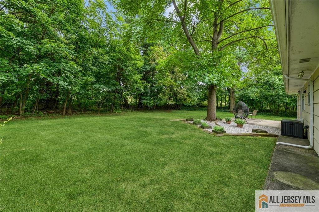 129 Cottrell Road Old Bridge, NJ 07747 - Photo 24 of 25 a view of a park with a tree