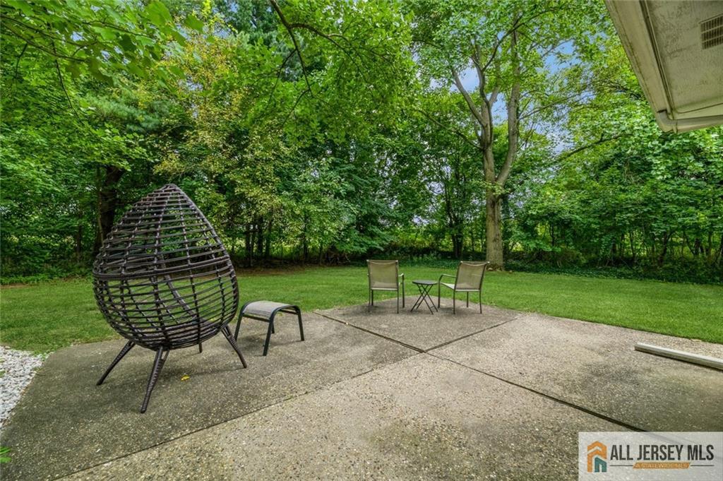 129 Cottrell Road Old Bridge, NJ 07747 - Photo 25 of 25 a garden view with a seating space