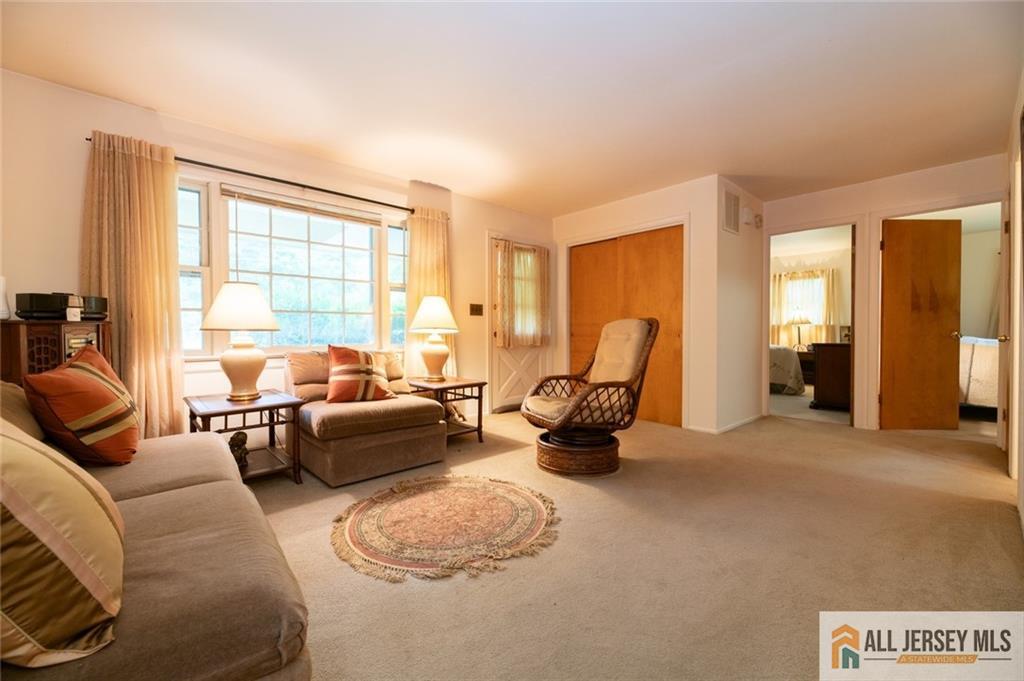 129 Cottrell Road Old Bridge, NJ 07747 - Photo 3 of 25 a living room with furniture and a window