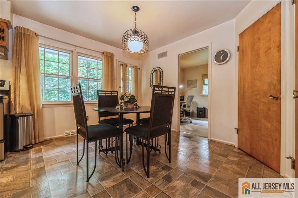 129 Cottrell Road Old Bridge, NJ 07747 - Photo 10 of 25 a view of a dining room with furniture window and wooden floor