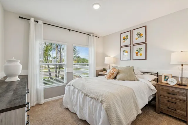 a view of a hallway and wooden floor