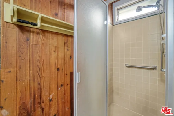 a view of a door and a window