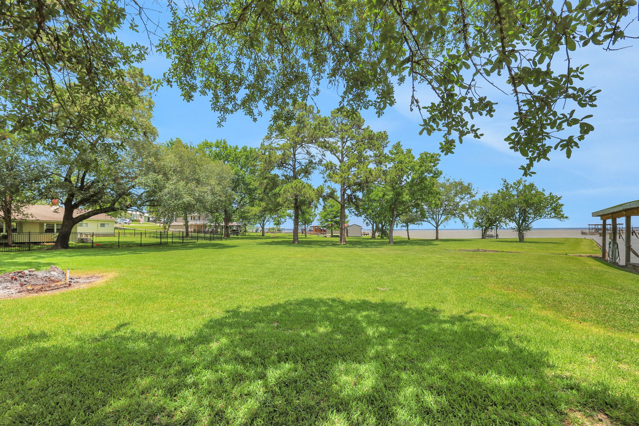 151 Lakeview Circle Coldspring, TX 77331 - Photo 4 of 29 The lot beautiful and dotted with shade trees