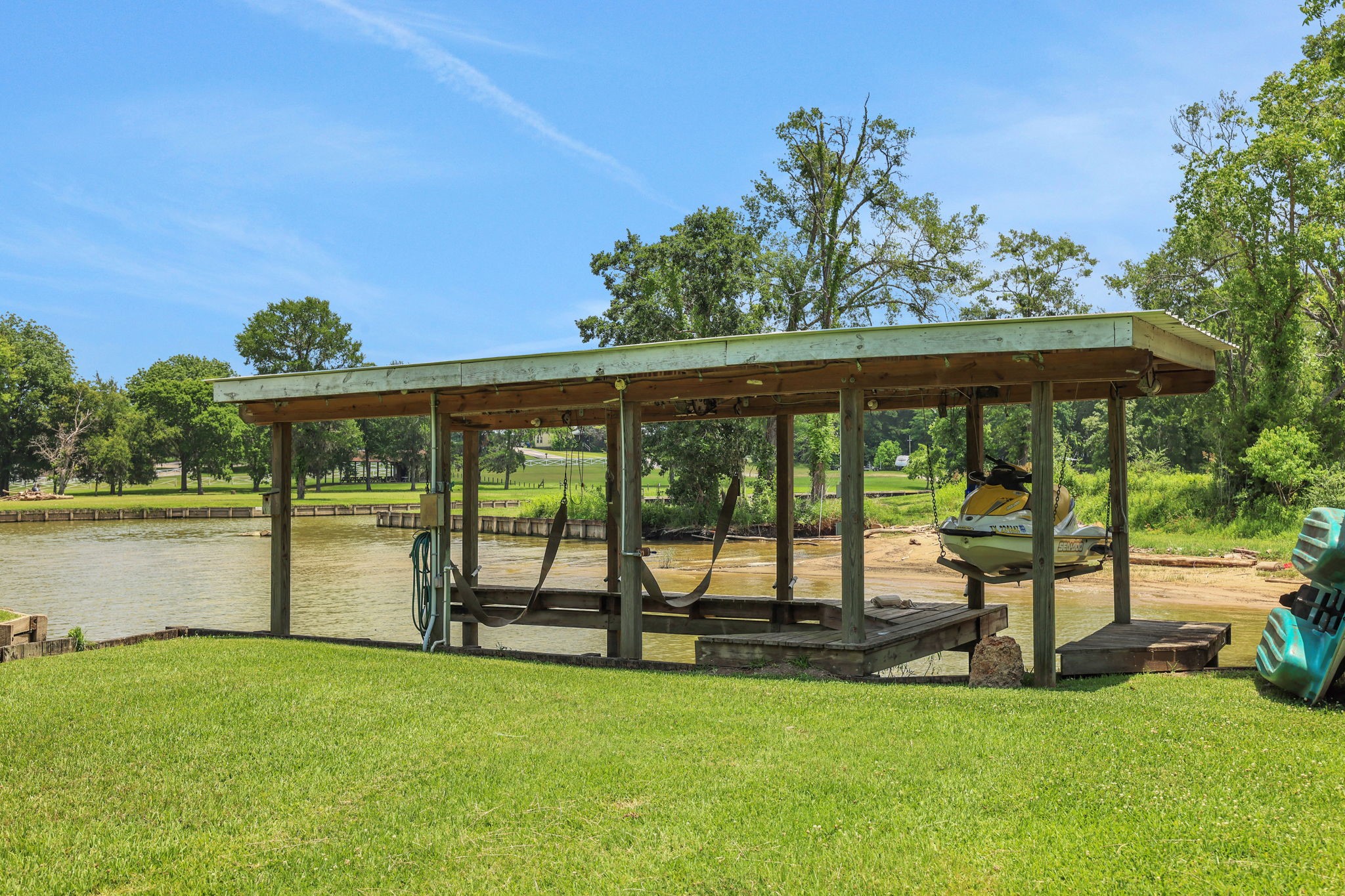 151 Lakeview Circle Coldspring, TX 77331 - Photo 9 of 29 Private boathouse and jet ski lift - the property also has its own boat ramp for kayaks or a john boat
