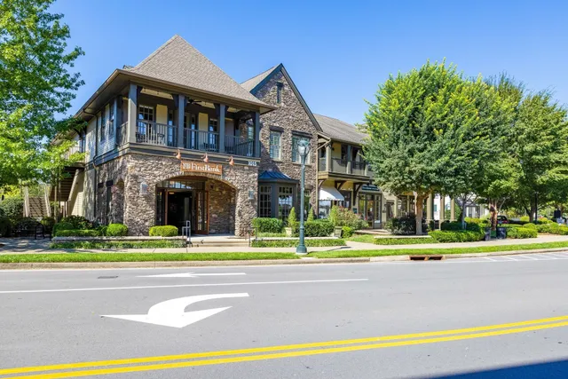 a front view of a house with a swimming pool