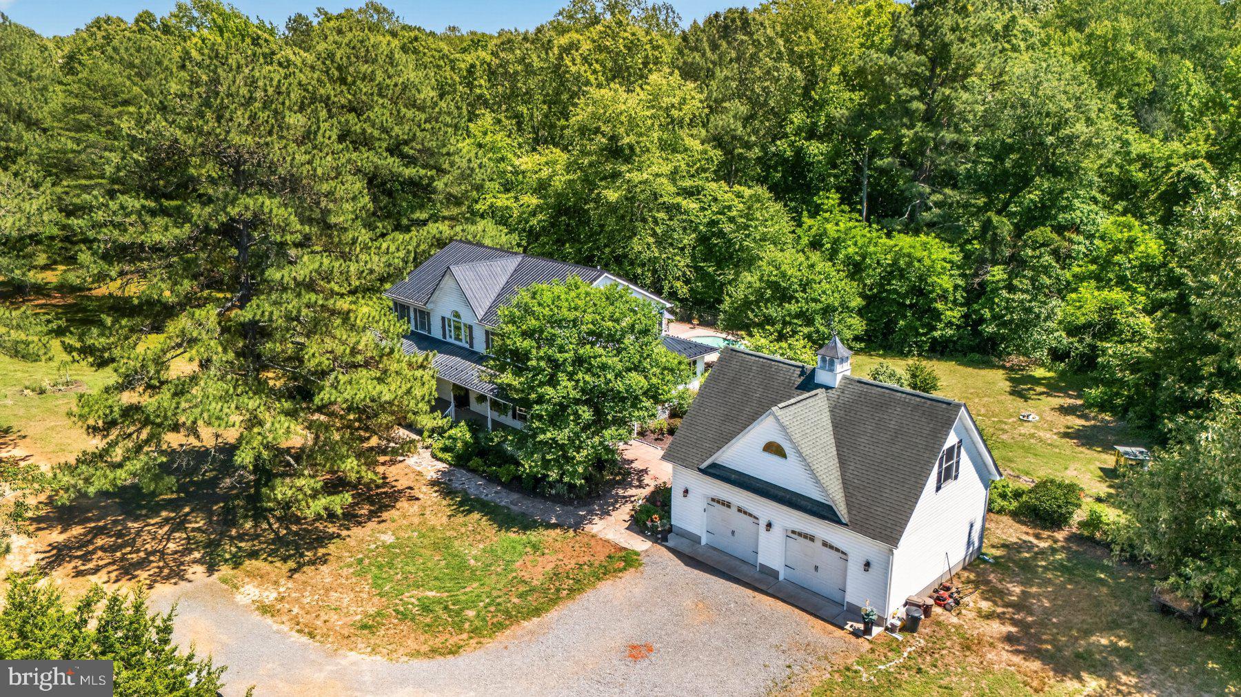 View of Home and Detached Garage