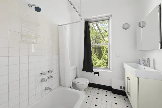 a kitchen with a stove and cabinets