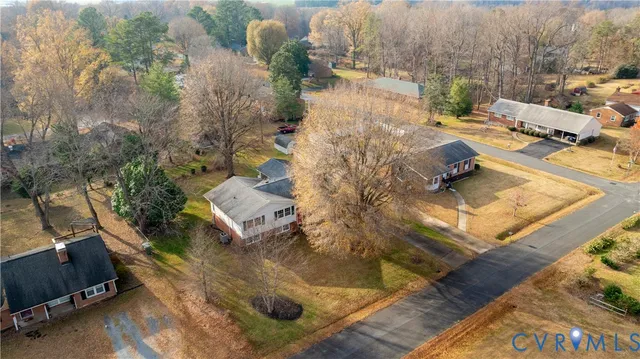 swimming pool view with a sitting space