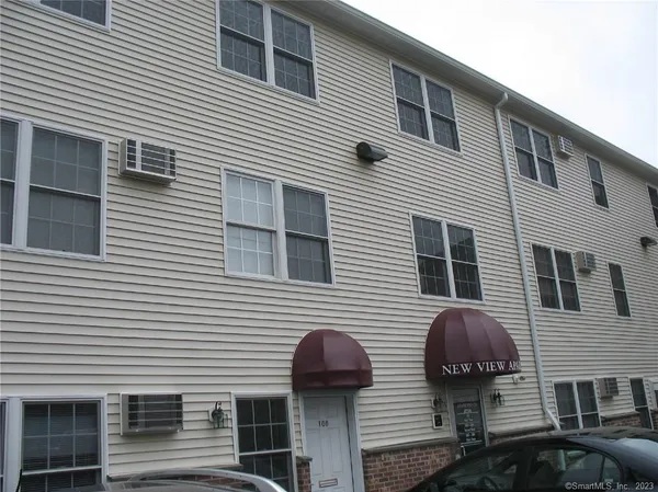 a view of a cars park in front of house