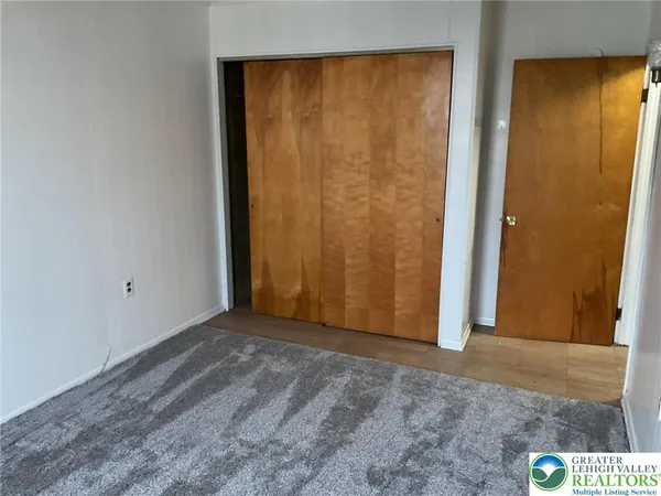 a view of an empty room with window