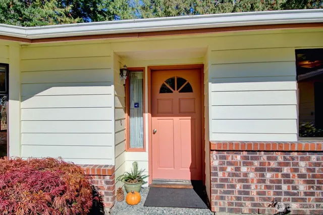 a front view of a house with a porch