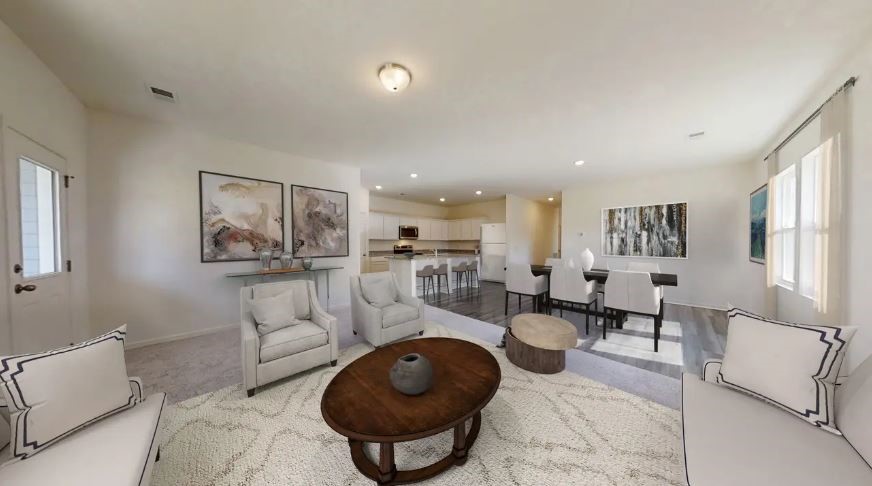 12801 Least Bittern Way Buda, TX 78610 - Photo 4 of 9 a living room with furniture and a rug