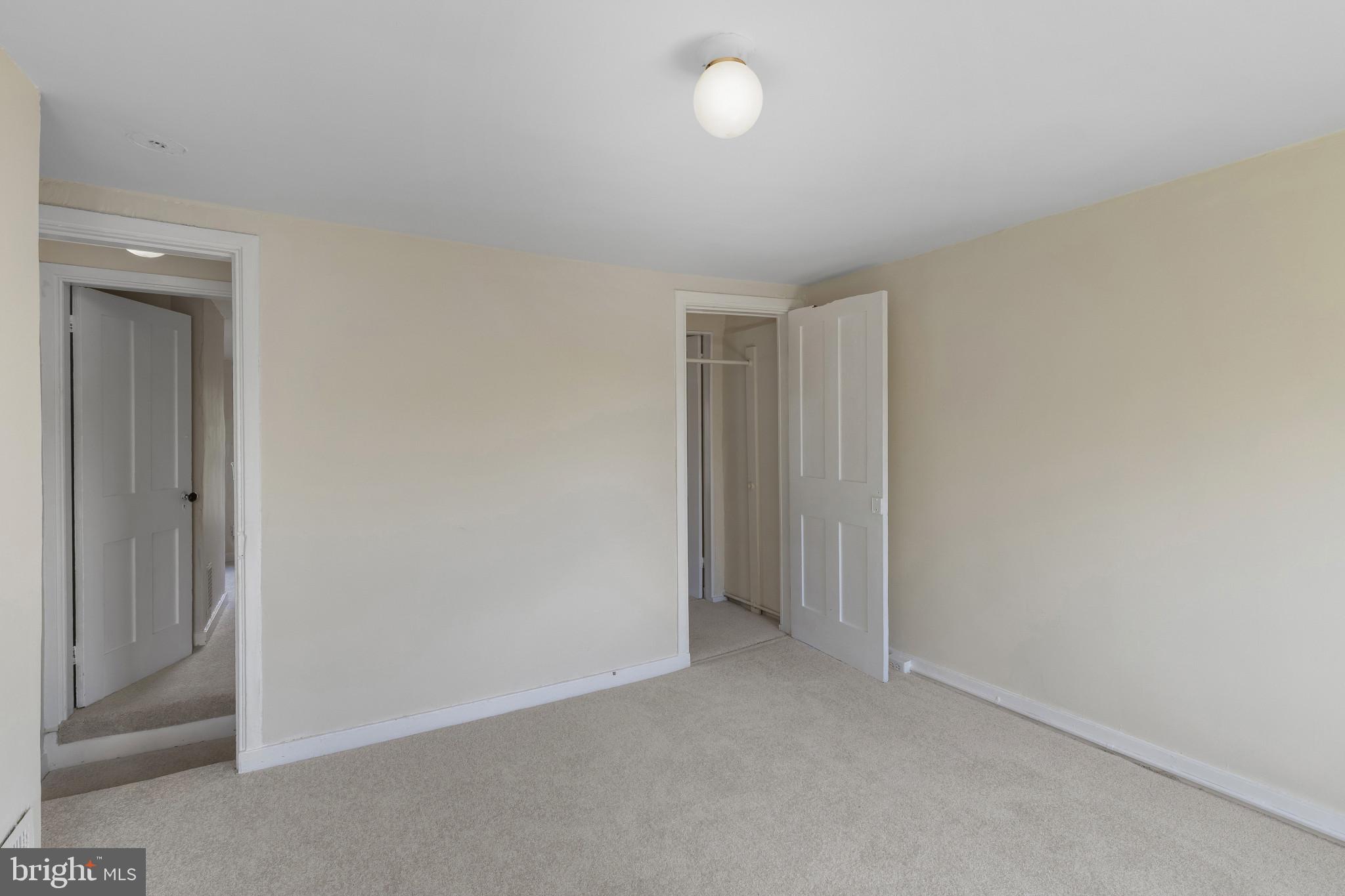 119 South Poppleton Street Baltimore, MD 21201 - Photo 19 of 27 a view of an empty room and closet area