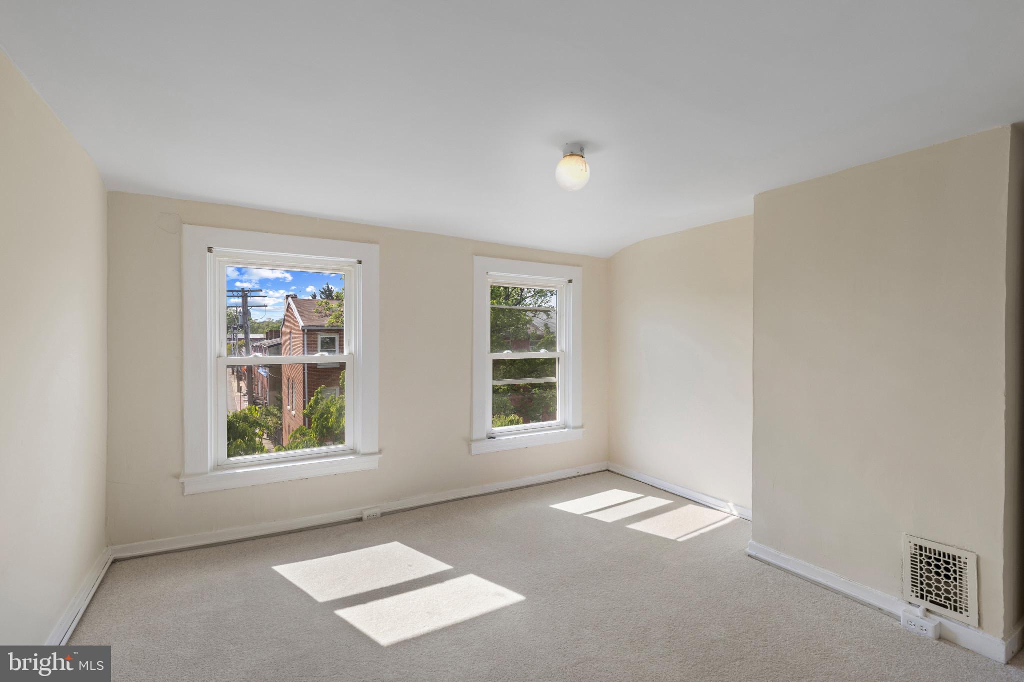 119 South Poppleton Street Baltimore, MD 21201 - Photo 21 of 27 a view of empty room with a window