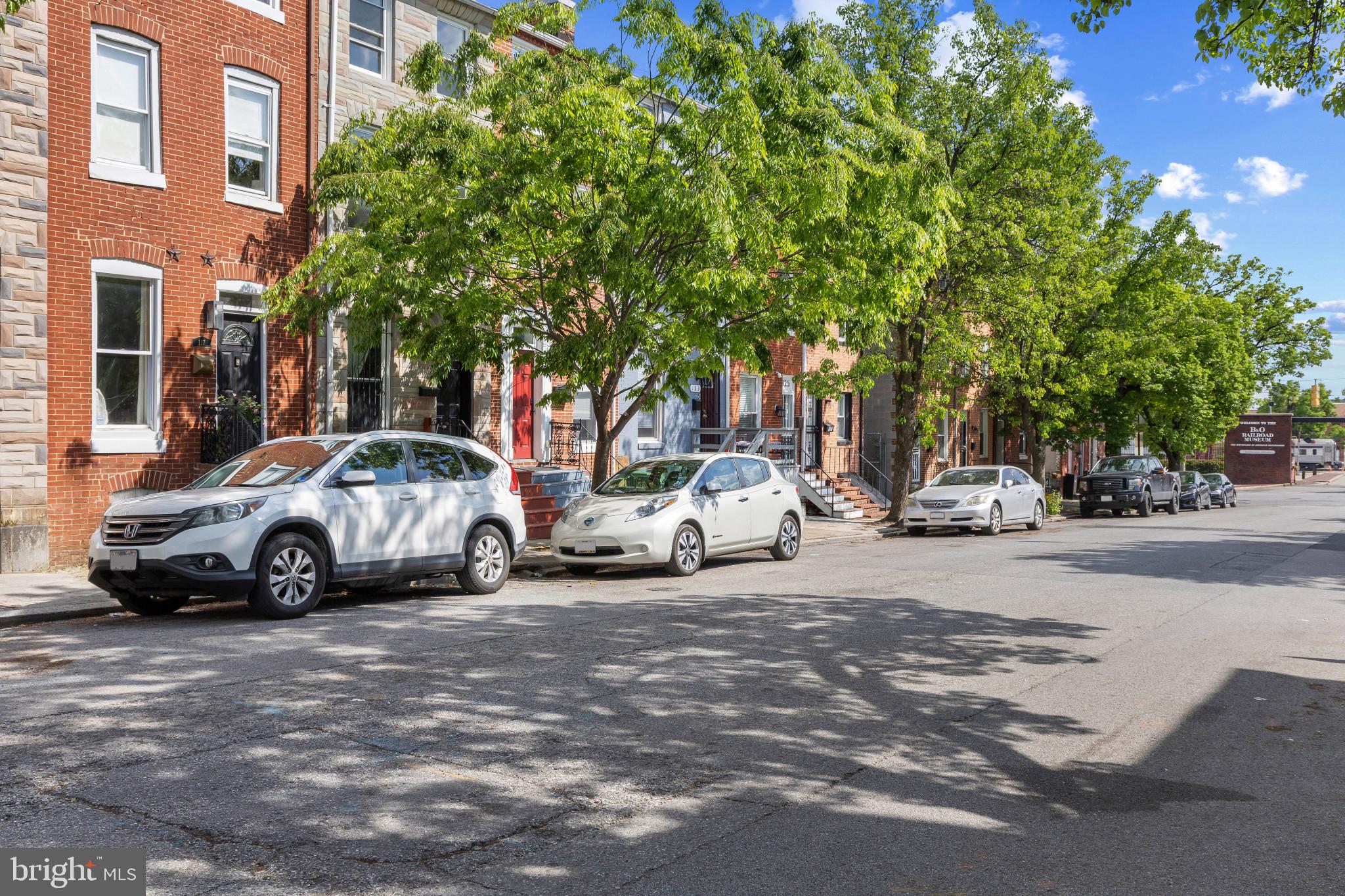 119 South Poppleton Street Baltimore, MD 21201 - Photo 3 of 27 a view of a cars parked on the side of a street