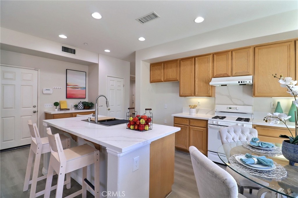4878 Streambay Court Riverside, CA 92505 - Photo 5 of 34 Kitchen with brand new quartz countertop, sink & faucet.