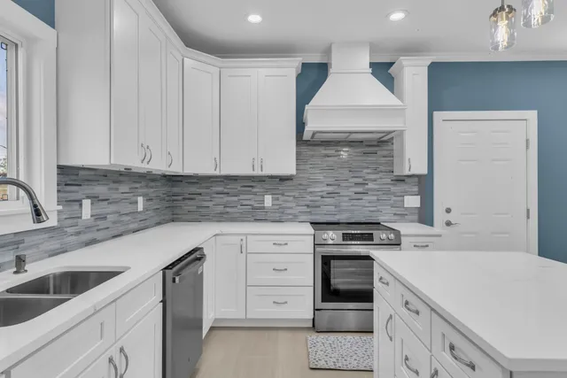 a room with a chair and a window