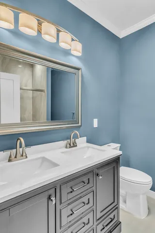 a front view of a house with a garage