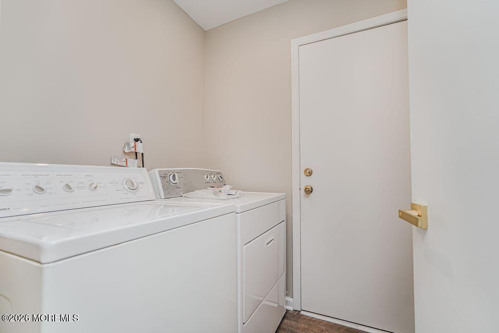3 Gatley Close, Unit 1000 Freehold, NJ 07728 - Photo 16 of 24 a utility room with dryer and washer