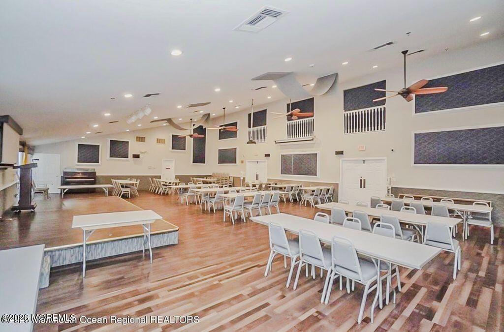 3 Gatley Close, Unit 1000 Freehold, NJ 07728 - Photo 23 of 24 a large kitchen with a table and chairs