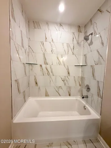 a bathroom with a bathtub