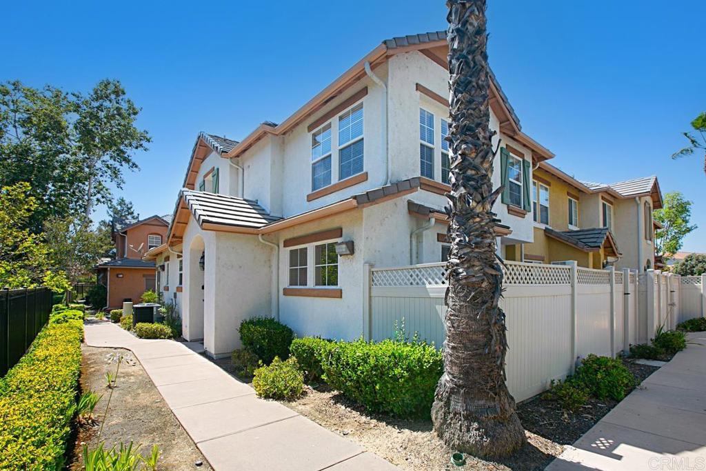 205 River Park Drive, Unit 11 Santee, CA 92071 - Photo 1 of 1 a front view of a house with a yard