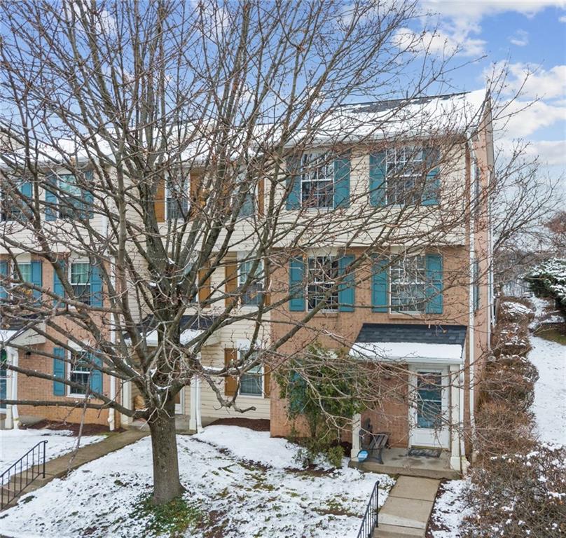 a view of a building with a yard