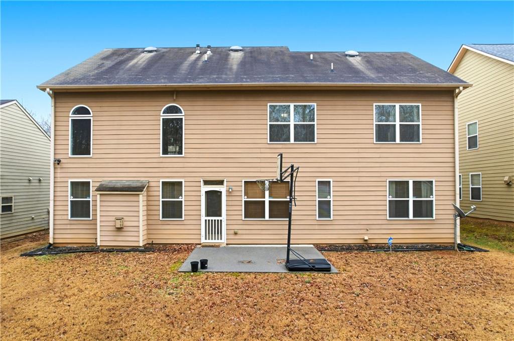 3411 Lynne Road Powder Springs, GA 30127 - Photo 26 of 27 a front view of a house with a yard