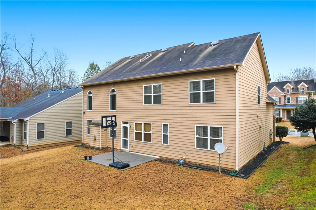 3411 Lynne Road Powder Springs, GA 30127 - Photo 27 of 27 a view of a house with a yard