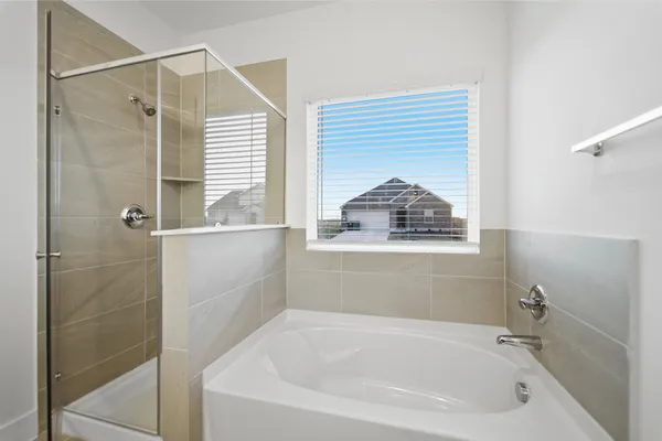 a bathroom with a sink a mirror and a toilet