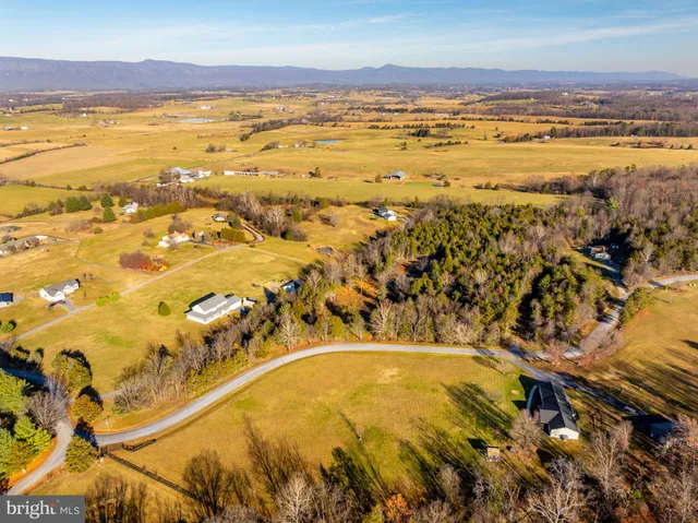 a view of an ocean and a mountain