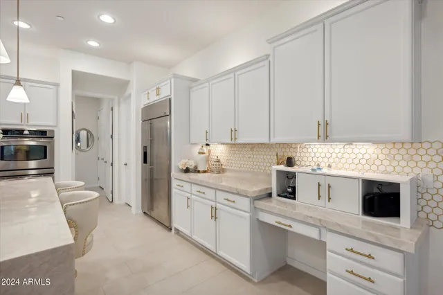 a view of storage and utility room with washer and dryer