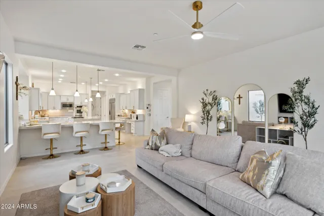 a bedroom with furniture and a couch