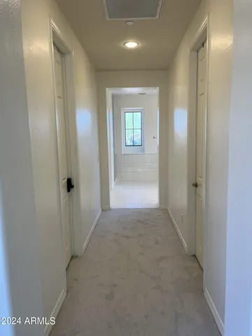 a view of a livingroom with furniture and a couch