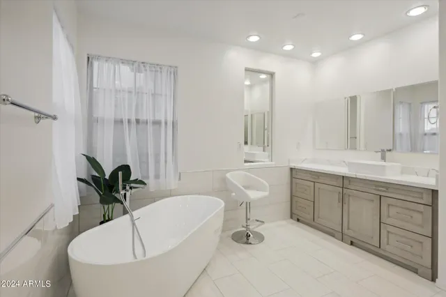 a view of living room with furniture and a large window